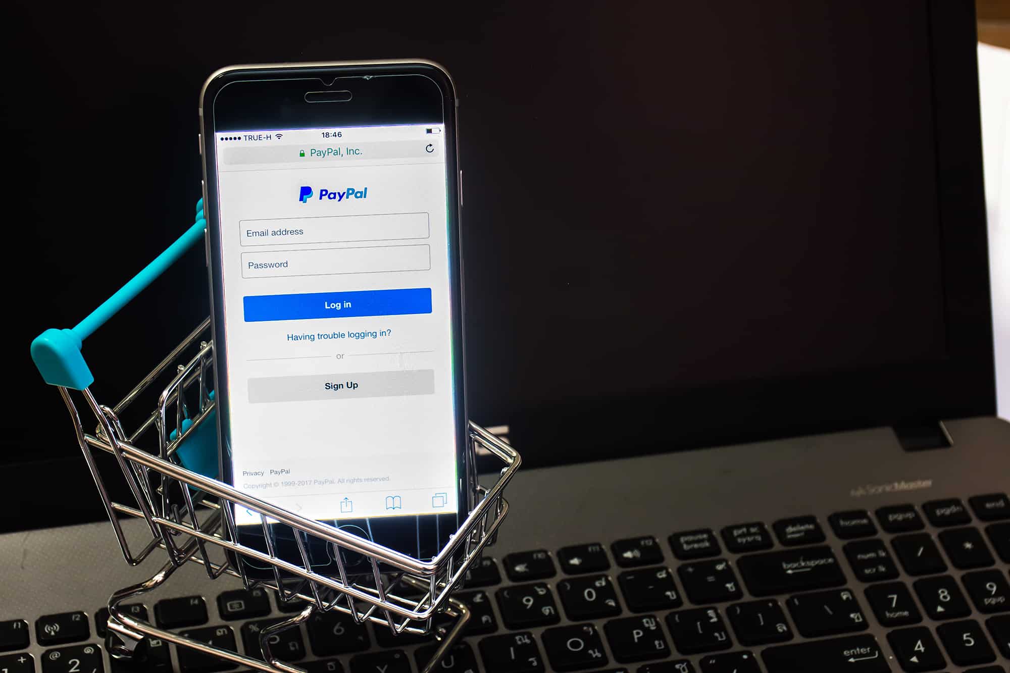 PayPal screen on mobile phone with shopping cart