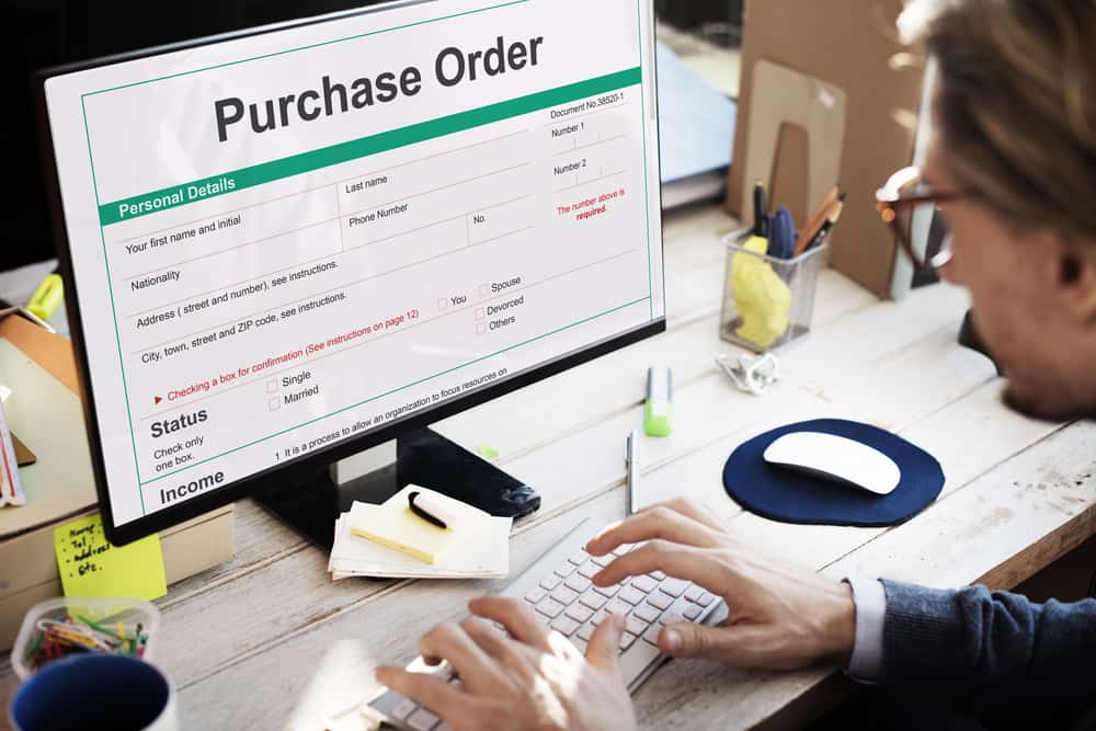 man viewing purchase order